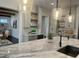 Gourmet kitchen with marble countertops, designer backsplash, and modern light fixtures at 906 Winall Down Ne Rd, Atlanta, GA 30319