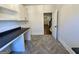 Laundry room featuring built in desk, cabinets and tile flooring at 906 Winall Down Ne Rd, Atlanta, GA 30319
