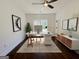 Bright office with modern desk, decor, large window and ceiling fan at 906 Winall Down Ne Rd, Atlanta, GA 30319
