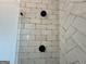 Modern shower with black hardware, tile walls, and seamless glass door at 906 Winall Down Ne Rd, Atlanta, GA 30319