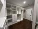 Spacious walk-in closet with custom shelving and drawers, providing ample storage and organization at 906 Winall Down Ne Rd, Atlanta, GA 30319