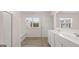 Bathroom featuring double vanity, walk in shower, and natural light at 2761 Honey Locust Court, Loganville, GA 30052