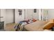 Tastefully designed bedroom with comic-themed bedding and easy access to closet and bathroom at 2761 Honey Locust Court, Loganville, GA 30052