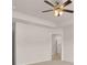 Comfortable bedroom featuring a ceiling fan and easy access to an ensuite bathroom, perfect for comfort and relaxation at 2761 Honey Locust Court, Loganville, GA 30052
