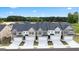 New townhomes boast brick accents, two-car garages, and modern design elements at 2761 Honey Locust Court, Loganville, GA 30052