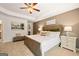 A main bedroom featuring a trey ceiling, neutral color walls, and carpeted floors at 2761 Honey Locust Court, Loganville, GA 30052