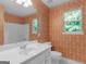 Well-lit bathroom featuring a single sink vanity, a large mirror and a shower, creating a bright and inviting space at 75 The Farm Rd, Mcdonough, GA 30252