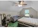 Bedroom featuring a ceiling fan, a window, a sofa and a bed; ready to be transformed into a cozy retreat at 75 The Farm Rd, Mcdonough, GA 30252