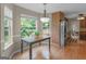 Cozy breakfast nook with a table set by bright windows, ideal for morning meals at 75 The Farm Rd, Mcdonough, GA 30252