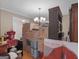 Bright living room filled with moving boxes and furniture, showcasing the space and potential for organization at 75 The Farm Rd, Mcdonough, GA 30252