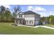 Spacious home boasts a well-manicured lawn, brick and siding exterior, with an attached two car garage at 924 Bryson Lake Cir, Douglasville, GA 30134