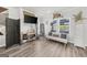 Airy living room showcasing natural light, contemporary decor, and sleek flooring at 924 Bryson Lake Cir, Douglasville, GA 30134