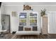 Cozy sitting area with large windows, a futon, and contemporary decorative details at 924 Bryson Lake Cir, Douglasville, GA 30134
