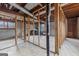 Unfinished basement with exposed ceiling, with framing to show potential space and layout at 3727 Calmer Cir, East Point, GA 30344