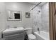 Elegant bathroom featuring a marble-tiled shower, white vanity, and modern fixtures at 3727 Calmer Cir, East Point, GA 30344