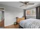 Bedroom featuring hardwood floors, a window with natural light, closet and a dresser at 3727 Calmer Cir, East Point, GA 30344