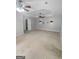 Expansive primary bedroom features neutral carpet, fan, and tray ceiling at 100 Little Creek Dr, Sharpsburg, GA 30277