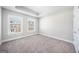 Well-lit bedroom with large windows overlooking the backyard and plush carpeting at 1341 Rosen Rd, Brookhaven, GA 30319