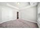 Bedroom featuring carpet, neutral walls, a closet, and a window with natural light at 1341 Rosen Rd, Brookhaven, GA 30319