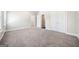 Spacious bedroom with plush carpeting, neutral walls, and ample closet space at 1341 Rosen Rd, Brookhaven, GA 30319