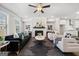A well-decorated living room boasts a stone fireplace, sleek furniture, and a contemporary rug at 1341 Rosen Rd, Brookhaven, GA 30319