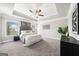 Main bedroom with neutral decor, ensuite bathroom and large windows at 1341 Rosen Rd, Brookhaven, GA 30319