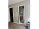 Clean bathroom is visible through the doorway with a tiled floor, sink, and toilet at 149 Wimberly Way, Powder Springs, GA 30127
