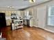 Eat-in kitchen with hardwood floors, a center island, and modern appliances at 149 Wimberly Way, Powder Springs, GA 30127