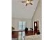 Bright living room with vaulted ceilings, hardwood floors, and lots of natural light at 149 Wimberly Way, Powder Springs, GA 30127