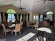 Clubhouse interior featuring well-appointed seating, large arched windows, and ample natural light at 406 Kenley Ct, Mcdonough, GA 30253