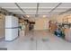 Spacious garage with storage cabinets and ample room for parking at 406 Kenley Ct, Mcdonough, GA 30253