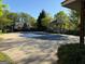 Covered pool area, surrounded by lush greenery, offering a relaxing outdoor experience at 406 Kenley Ct, Mcdonough, GA 30253