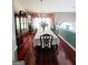 Formal dining room featuring a chandelier, large china cabinet, and a long table for hosting dinner parties at 3870 Michaels Creek Ct, Loganville, GA 30052