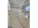Bathroom featuring a tub and shower combination and white vanity with chrome hardware at 103 Belair Ln, Stockbridge, GA 30281