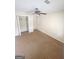 Bedroom with carpet, ceiling fan and standard closet space at 103 Belair Ln, Stockbridge, GA 30281