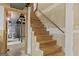 Unfinished basement stairs lead to future living space, ready for your personal design touch at 3588 Sw Highridge Dr, Conyers, GA 30094