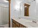 Bright bathroom with a double sink vanity and a full shower-tub combo at 3588 Sw Highridge Dr, Conyers, GA 30094