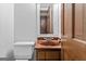 Charming bathroom featuring a red marbled sink and a classic vanity at 3588 Sw Highridge Dr, Conyers, GA 30094