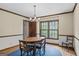 Charming dining room with a traditional table and bright windows at 3588 Sw Highridge Dr, Conyers, GA 30094