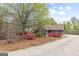 Traditional home with mature landscaping on a spacious lot at 3588 Sw Highridge Dr, Conyers, GA 30094