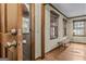 Bright foyer with hardwood floors and a welcoming entryway at 3588 Sw Highridge Dr, Conyers, GA 30094