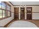Living room with hardwood floors, wainscoting, and natural light at 3588 Sw Highridge Dr, Conyers, GA 30094