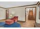 Comfortable living room with a classic design and staircase at 3588 Sw Highridge Dr, Conyers, GA 30094