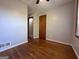 Charming bedroom with hardwood floors, fresh paint, and natural light coming through the window at 5183 Jones Ct, Morrow, GA 30260