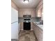 Functional kitchen with ample counter space, appliances, and classic cabinetry at 5183 Jones Ct, Morrow, GA 30260