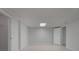 Unfurnished basement space with tile flooring and a drop ceiling with recessed lighting at 210 Sweetwater Dr, Fayetteville, GA 30214