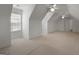 Bright bonus room with carpet, three ceiling fans, and multiple windows for natural light at 210 Sweetwater Dr, Fayetteville, GA 30214