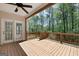 The back deck has a ceiling fan and plenty of space for entertaining at 210 Sweetwater Dr, Fayetteville, GA 30214