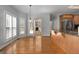 Open-concept kitchen featuring stainless appliances, granite countertops, and access to the deck at 210 Sweetwater Dr, Fayetteville, GA 30214