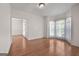 Spacious living room featuring a bay window, hardwood floors, and natural light at 210 Sweetwater Dr, Fayetteville, GA 30214
